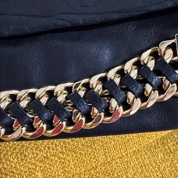 NWOT Vince Camuto 100% Raven clutch bag with gold accents🍀🍀